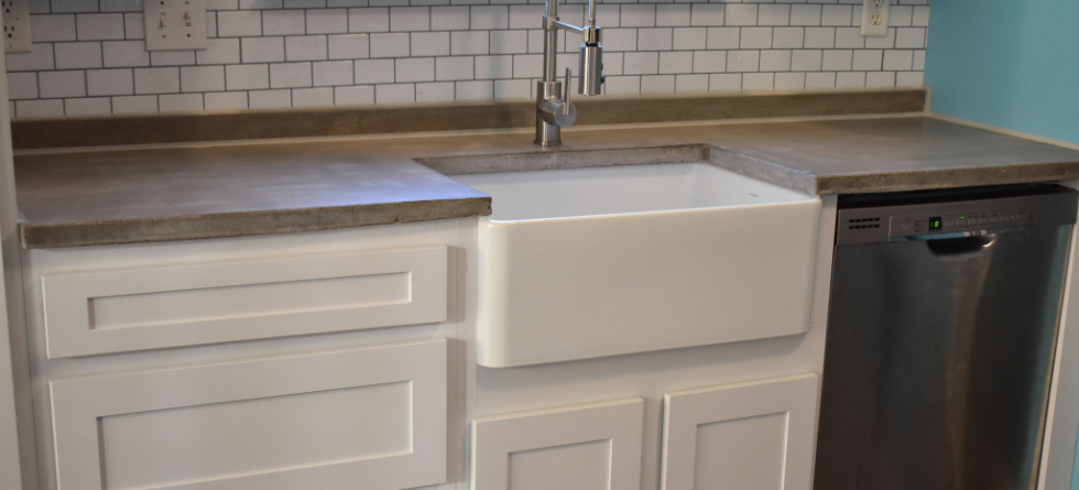 How does a farmhouse sink sit on a cabinet? - Quality Granite & Quartz ...